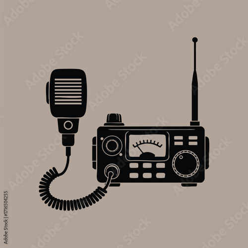 Black silhouette of a vintage radio transceiver with microphone and antenna on a plain background