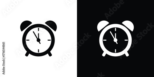 Classic alarm clock icons in black and white