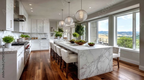 Modern kitchen with marble island and panoramic views