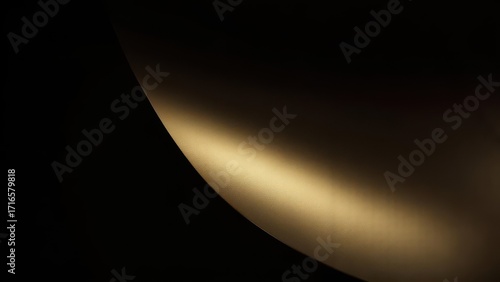 Luxurious golden light illuminates textured surface creating elegant abstract background for luxury brands