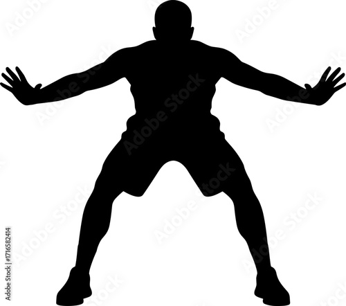 Basketball defender crouched arms wide, ready to block, front view, solid black silhouette
