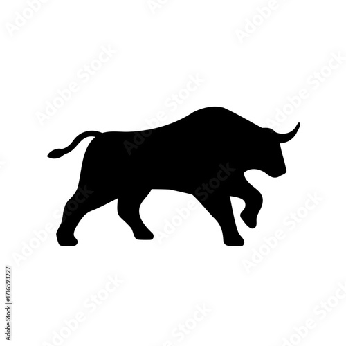 Silhouette of a powerful bull striding forward against a white background image