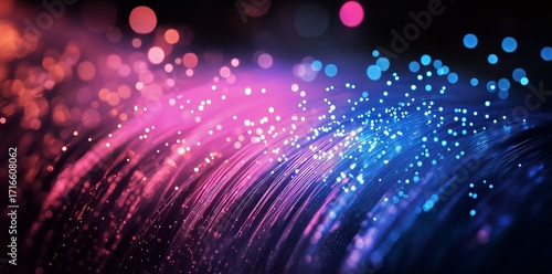 Colorful Light Trails Creating a Vibrant Visual Display in a Dark Space During an Artistic Event.