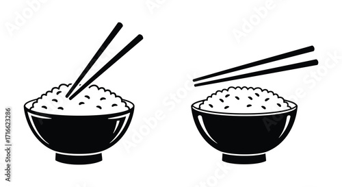 Simple black and white illustration of bowls of rice with chopsticks