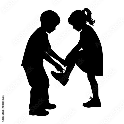 Boy helps girl tie shoelace silhouette children