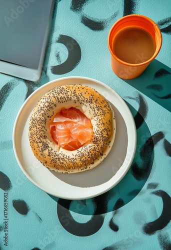 Fresh Bagel With Salmon on a Colorful Table and a Cup of Coffee in a Casual S...