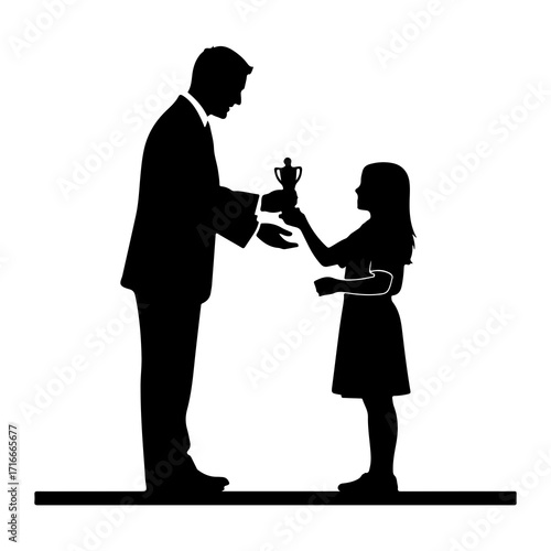 Man presents trophy to child silhouette award