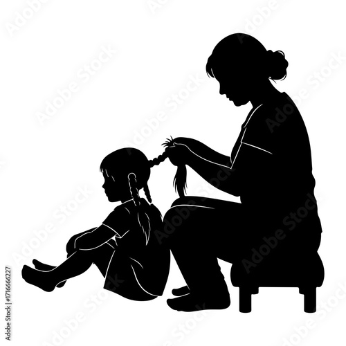 Mother braiding daughters hair silhouette