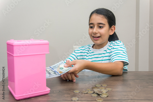 The happiness of the girl who took dollars from her piggy bank