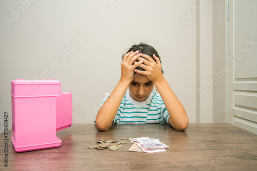 The disappointment of the girl who doesn't have enough money in her piggy bank