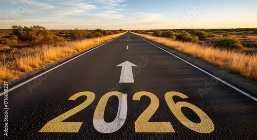 Stretching Road with 2026 Painted and Forward Arrow in Warm Dawn Light