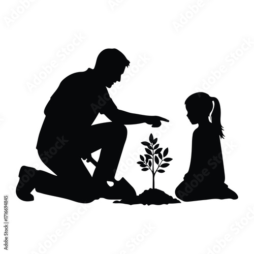 Father and daughter planting tree sapling