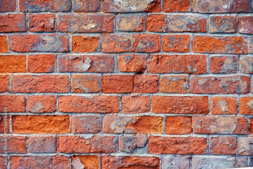 Obraz premium Old masonry with hidden red brick.