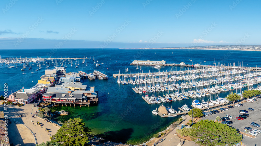 Fototapeta premium aerial drone view of Monterey Bay, California with old fisherman's wharf and marina