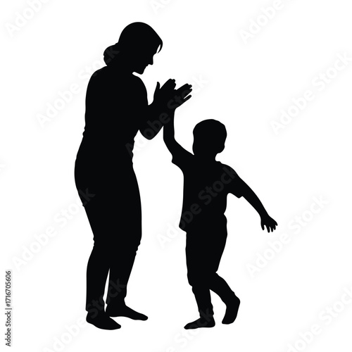 Mother and child high five celebration silhouette clapping