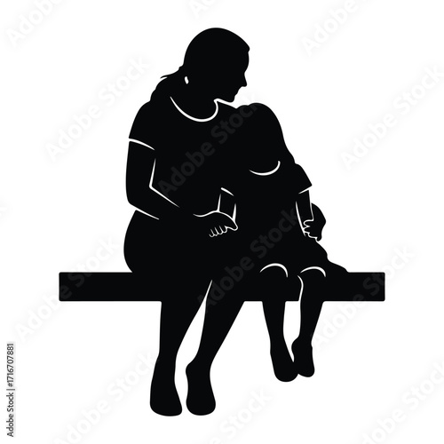 Mother child embrace silhouette sitting