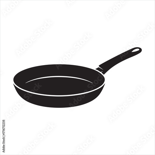 Empty new black cast iron frying pan isolated on a white background