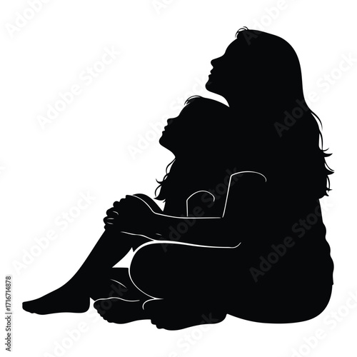 Silhouettes of mother and child embracing embrace love