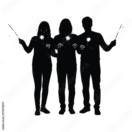 Silhouettes of people holding sparklers celebration