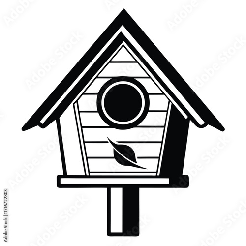 Striking Silhouette of a Birdhouse with Leaf Motif and Circular Entrance Hole Design