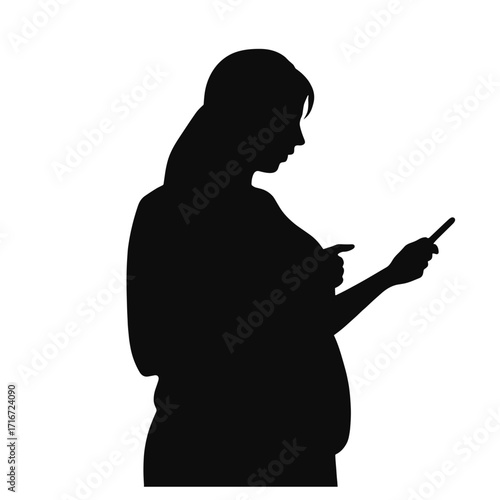 Pregnant woman silhouette using smartphone while standing indoors  