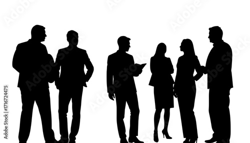 Group of business people silhouetted while discussing ideas  