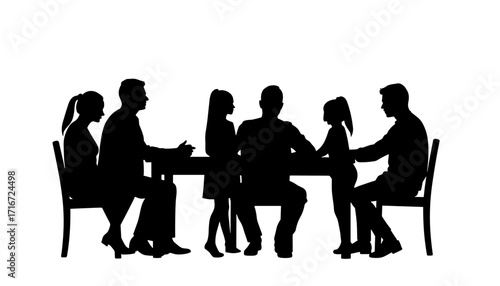 Family silhouette having a discussion around the dining table  