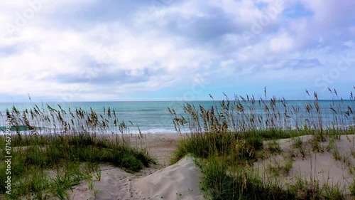 Walking up to the beach from a sand dune