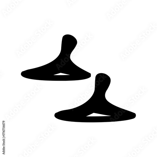 Two silhouetted stylized figures appear to be poised in an abstract dance