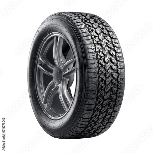 Close up studio shot of a rugged all terrain vehicle tire with a detailed tread pattern mounted on a dark alloy wheel isolated on transparent background