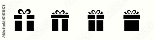 Four Gift Box Icons in Black with Bows Aligned on a White Background