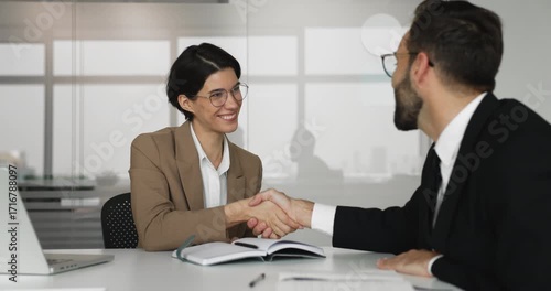 Wallpaper Mural Positive confident professional expert woman shaking hands with business partner Torontodigital.ca