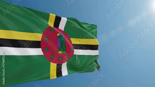 A realistic digital video of the Dominica national flag waving gently in the morning, with a clear blue sky behind it.