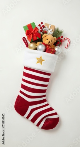 Festive striped stocking overflowing with holiday treats and gifts, celebrating the joy and magic of the season.