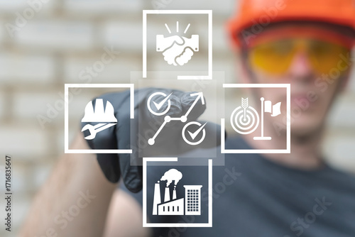 Engineer using virtual touch screen presses icon of growth chart with check marks symbolizing: growth in manufacturing productivity. Performance KPI Efficiency Industry Concept.