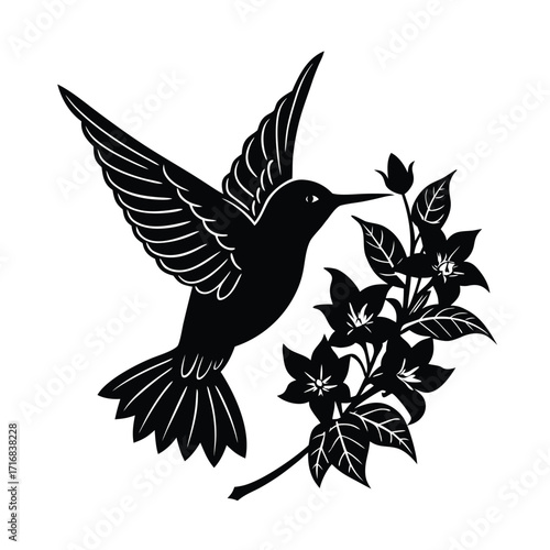 Hummingbird hovering over a vibrant flower cluster with wings outstretched