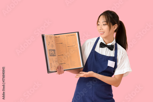 Young Asian smiling waitres...