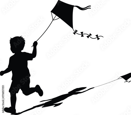 Silhouette of a boy running with a kite on a white background creating a shadow of himself and the kite