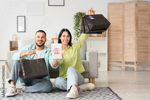 Young couple with shopping ...