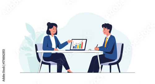 A manager and an employee review performance data and business growth on a laptop during a one-on-one meeting.