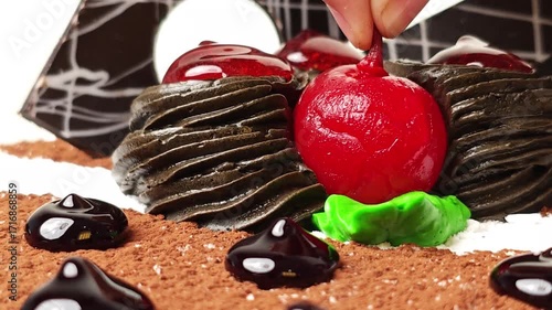 Close-up of Delicious Chocolate Cake with Cherries and Cream