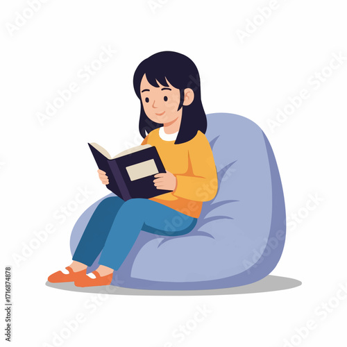 Cartoon girl with black hair in an orange sweater reading a book while sitting on a blue beanbag chair.