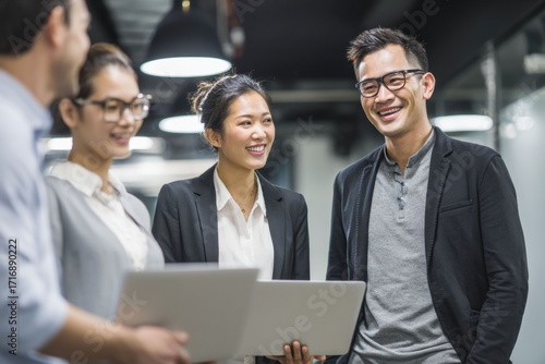 A diverse group of professionals of different ethnicities and backgrounds, working together in a harmonious and inclusive office environment.