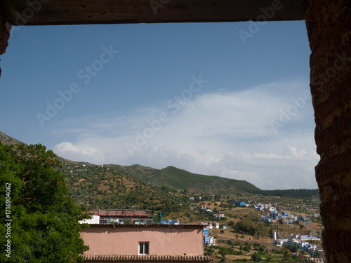 View of hills and blue houses from the Kasbah of Chefchaouen, Morocco