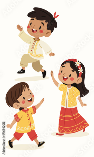 Delightful Filipino children happily dancing in traditional clothing for cultural celebration