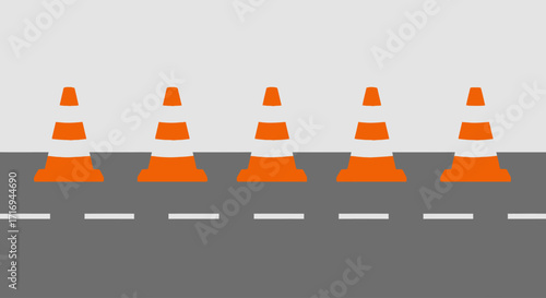 Five orange traffic cones line a road, indicating construction or maintenance.