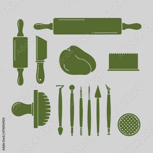 Set of various green pottery and clay sculpting tools including rolling pins, knives, modeling tools, and texture stamps