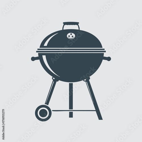 Round charcoal grill with lid and wheels designed for outdoor cooking and barbecuing in backyard settings