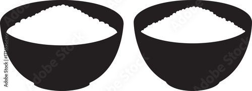 Two bowls of white powder in silhouette