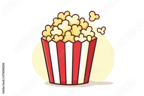 Popcorn in a striped bucket ready for movie night or snack time joy 
